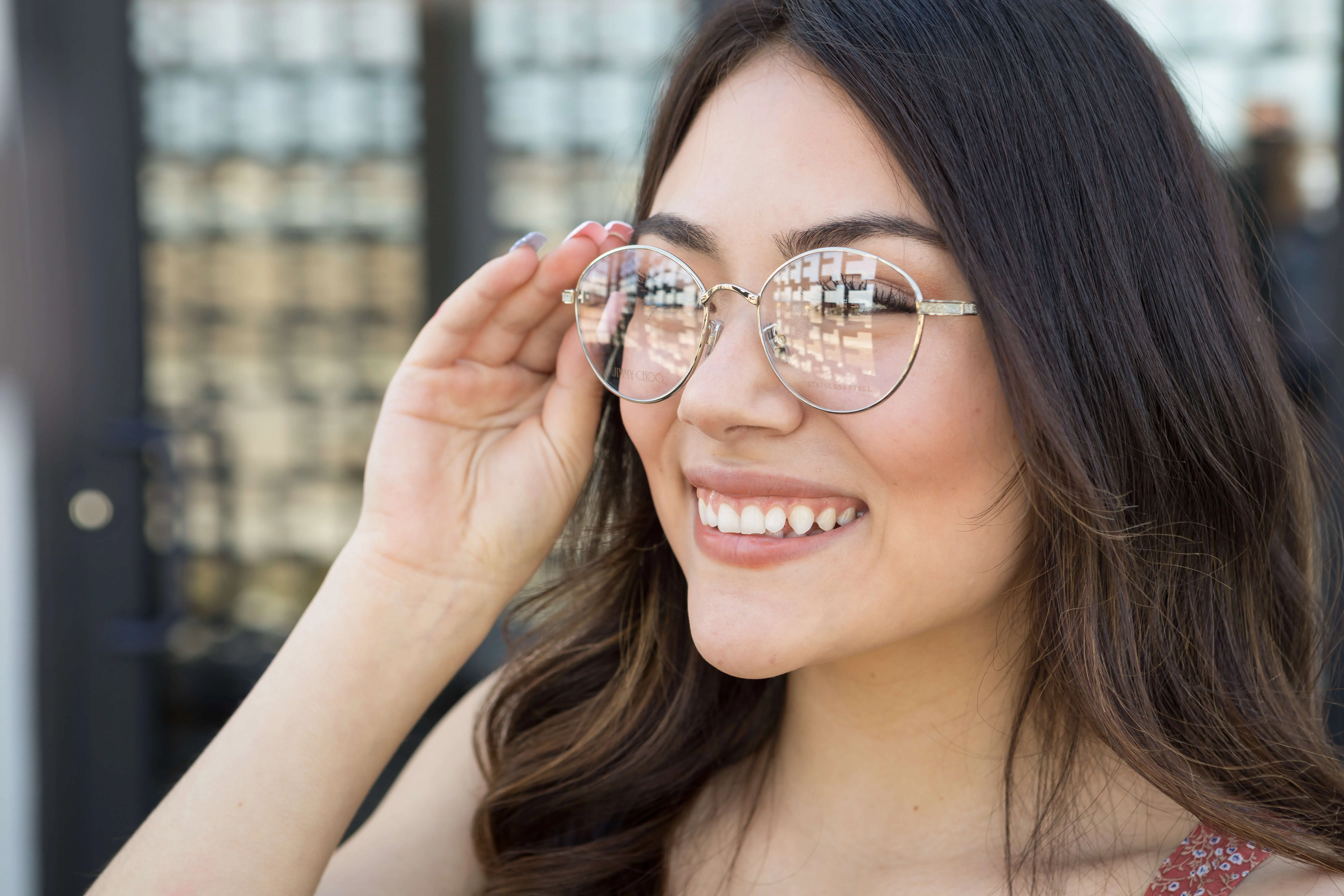 Women smiling with new glasses
