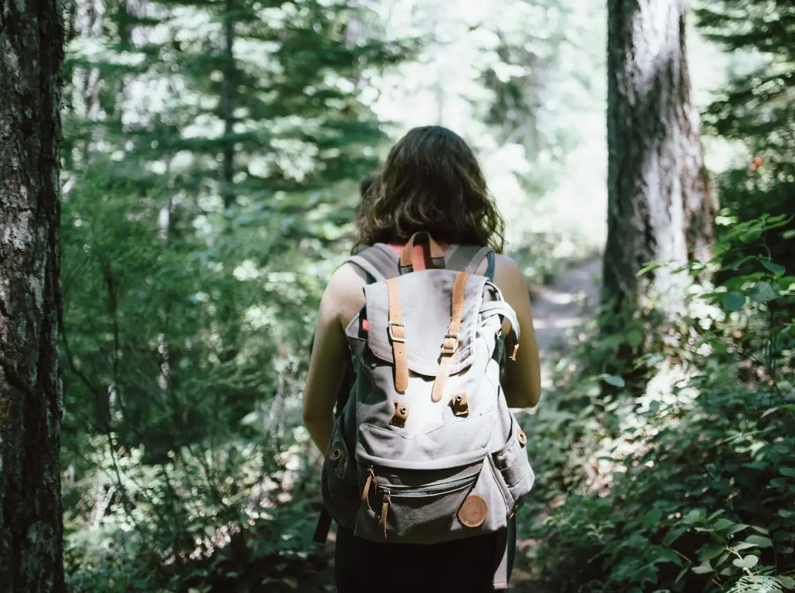 Woman hiking in the woods