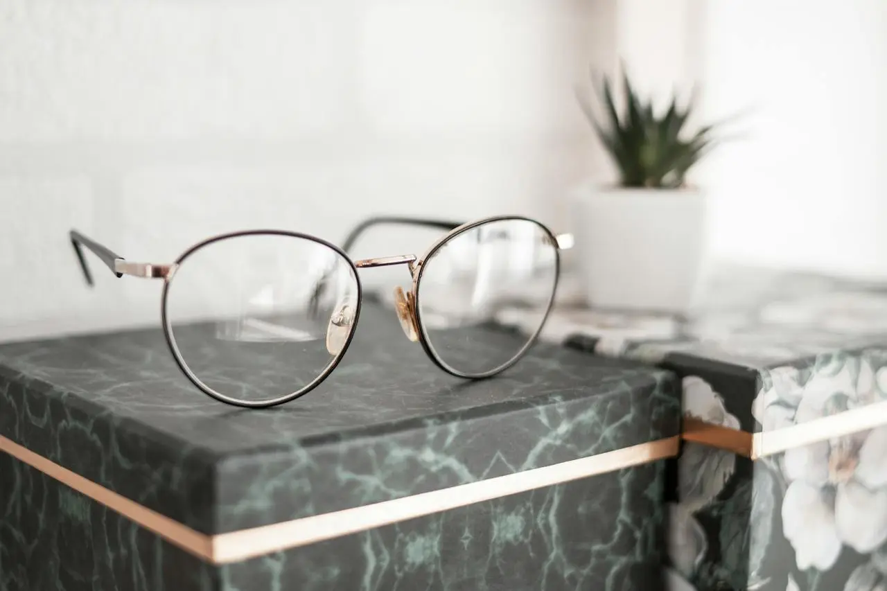 glasses on a marble box