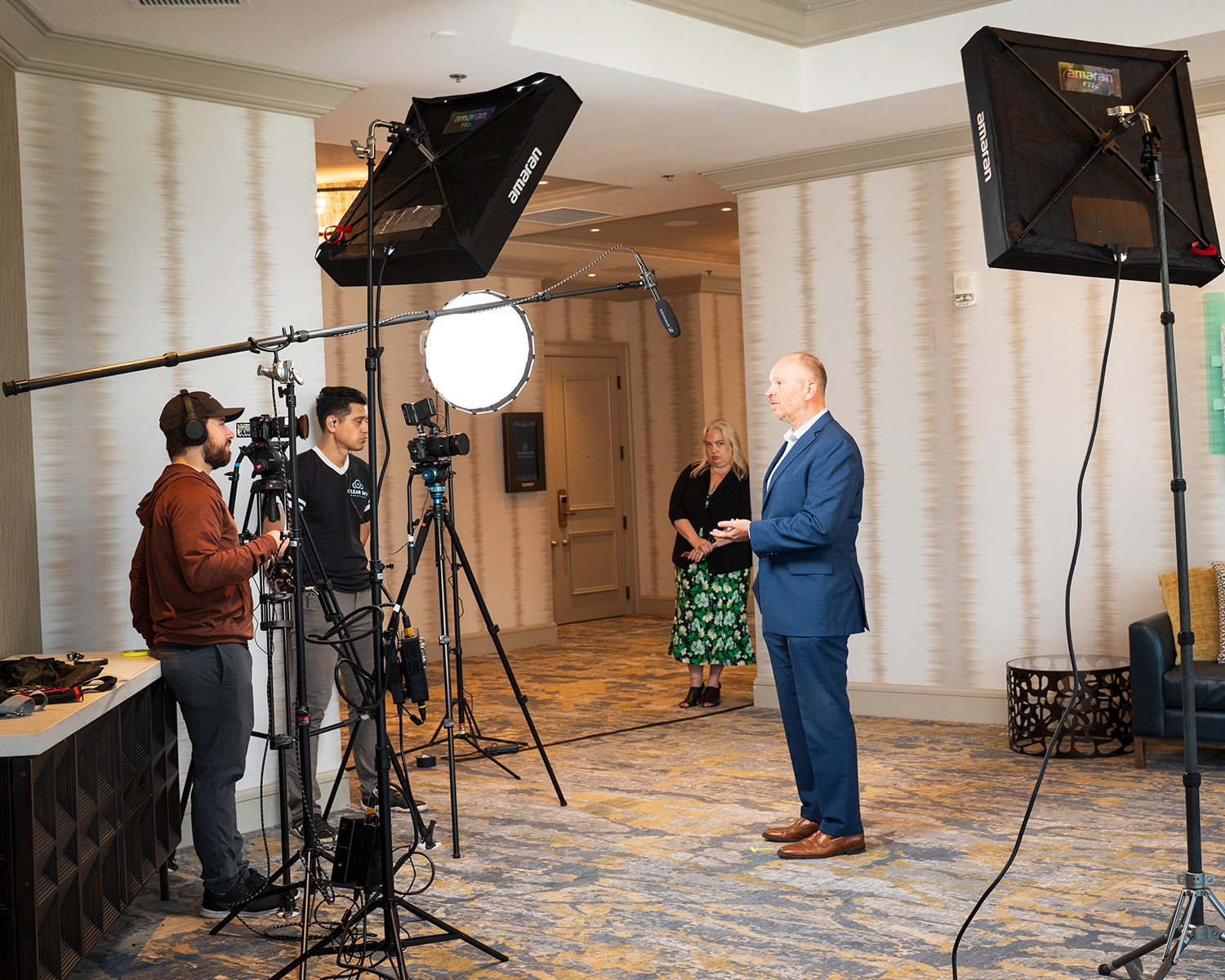 man being interviewed on camera