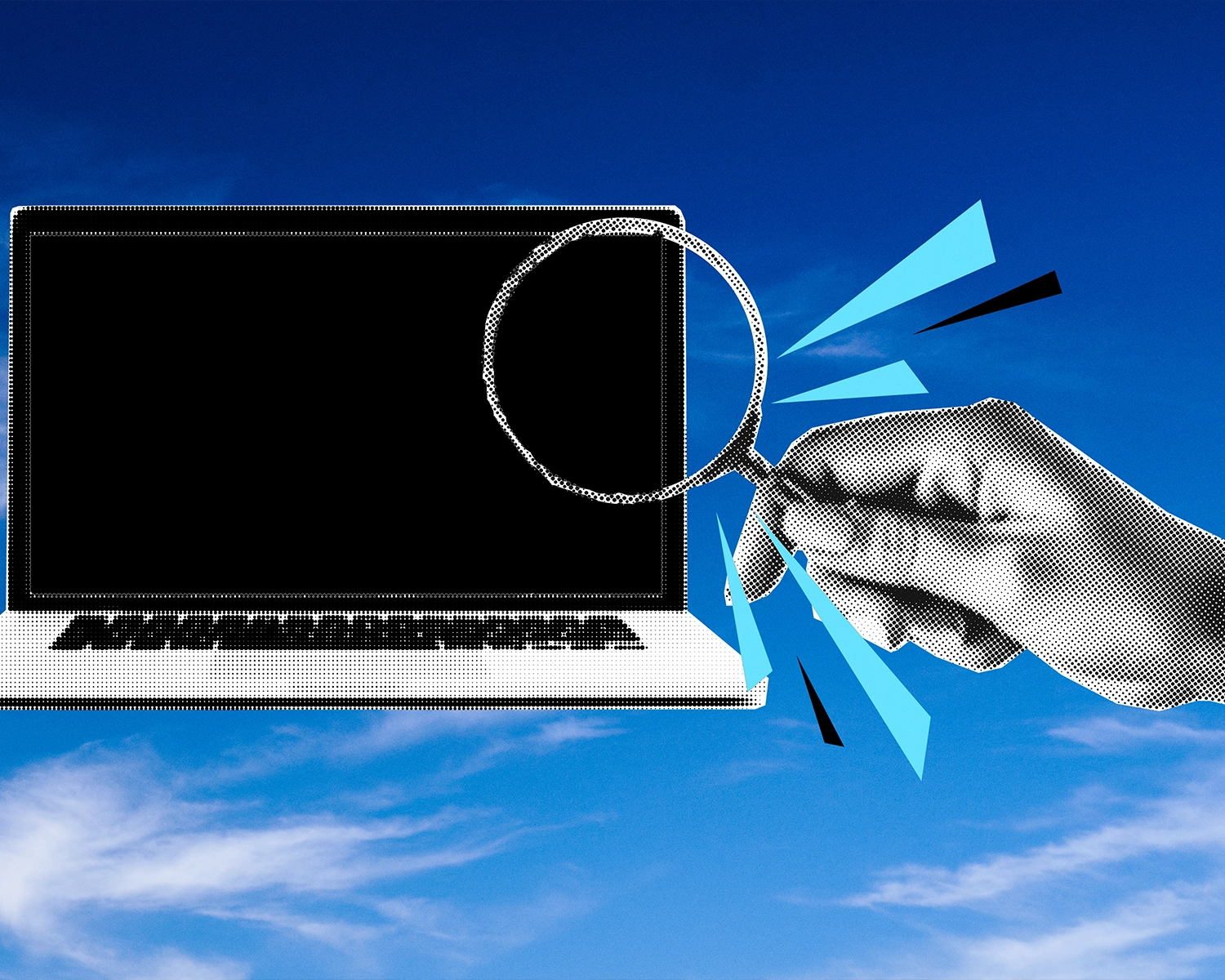 photo of a magnifyung glass over a laptop