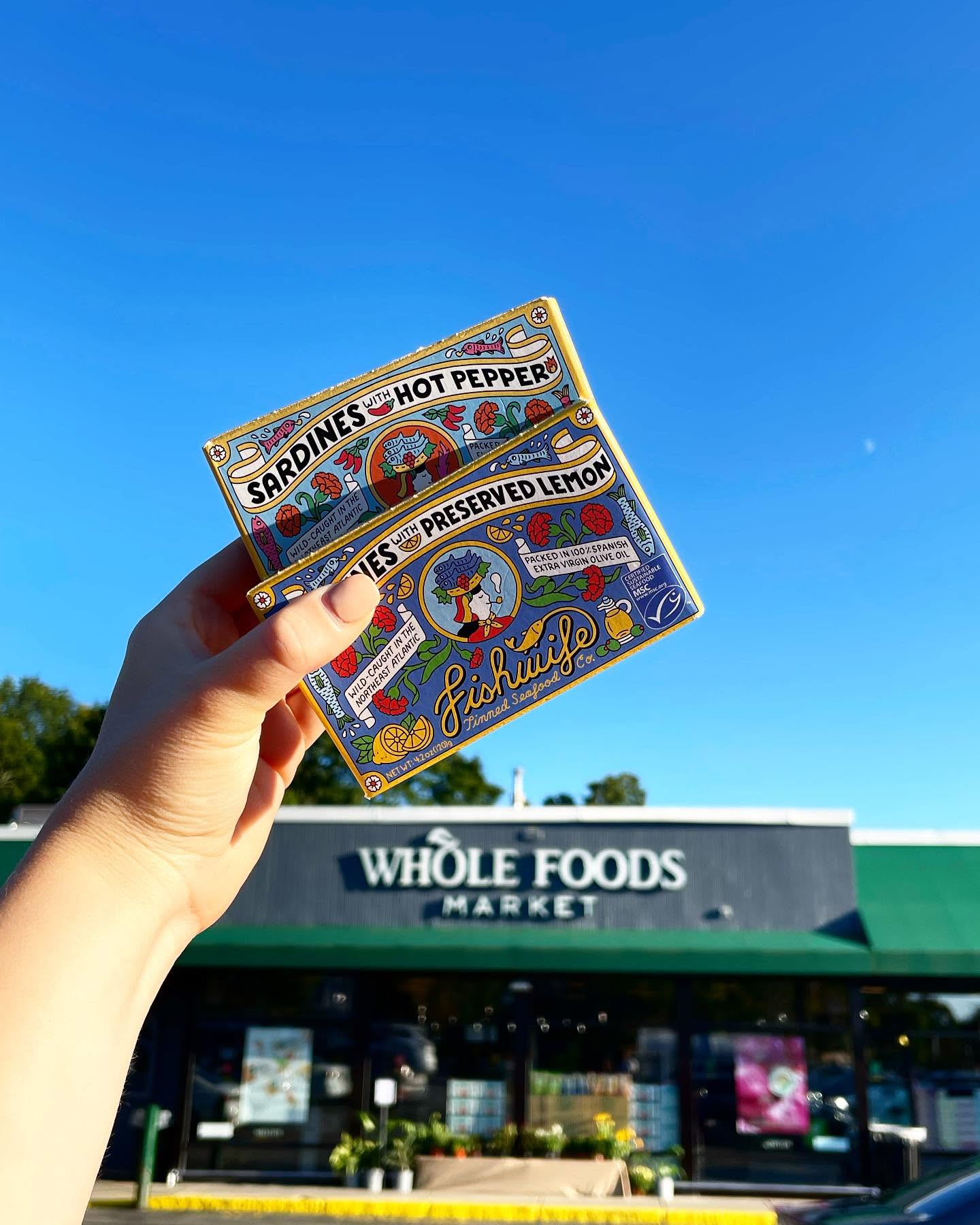 Fishwife image showing a person holding fishwife products