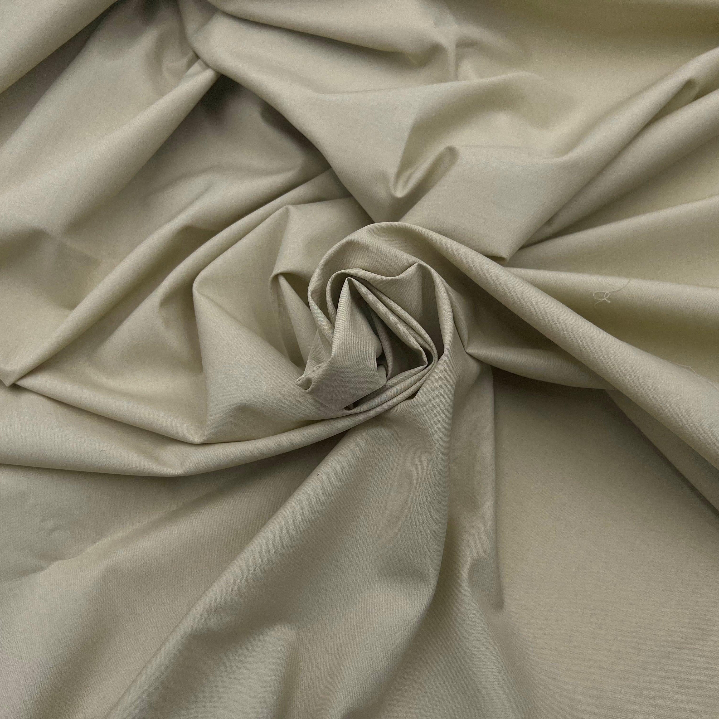 Draps en percale de coton dans une chambre
