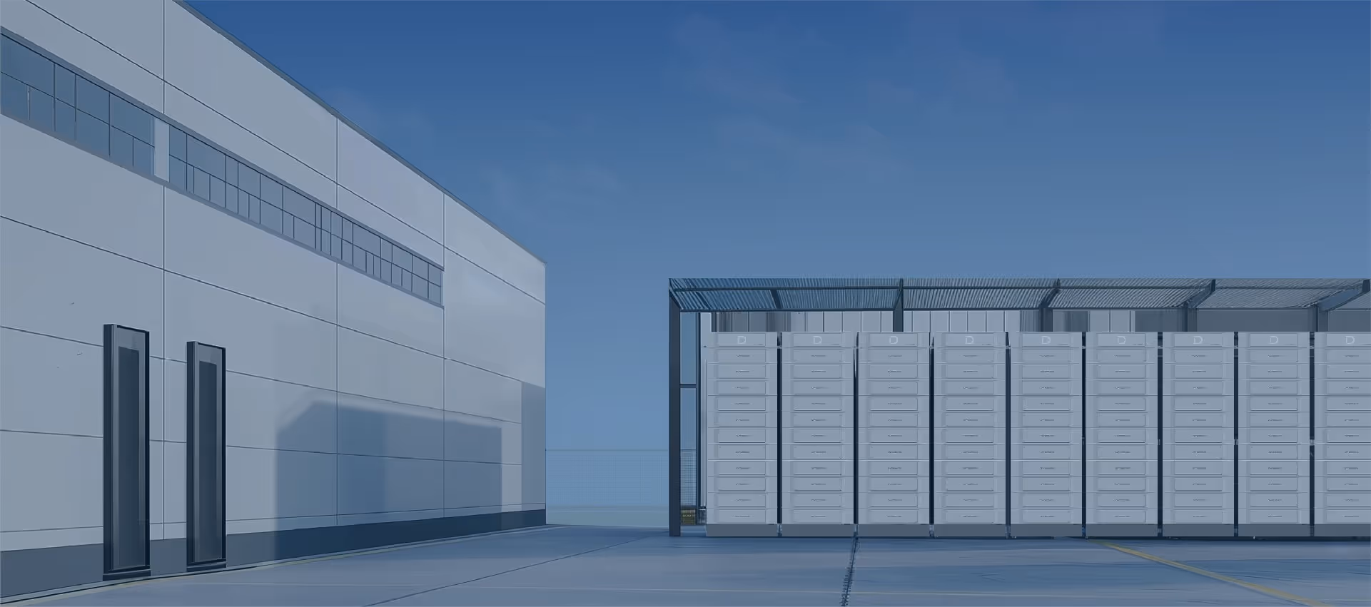 Moderni ulkorakennus valkoisine seinineen ja katoksellinen säilytysalue rivissä oleville yksiköille.