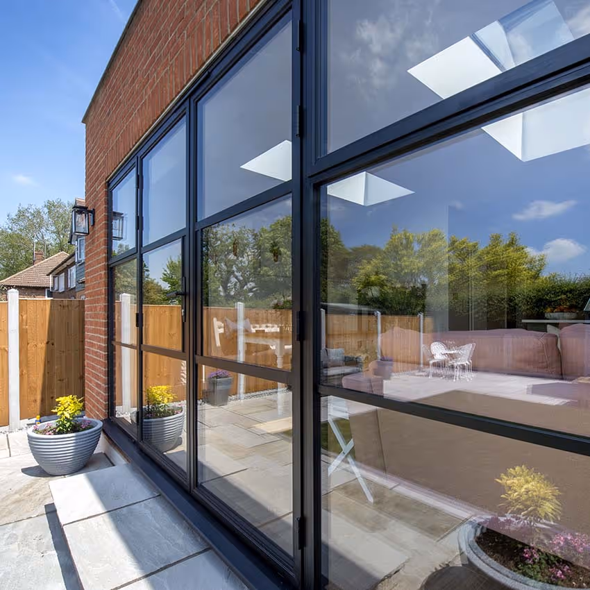 External heritage doors and fixed screens on an extension renovation 