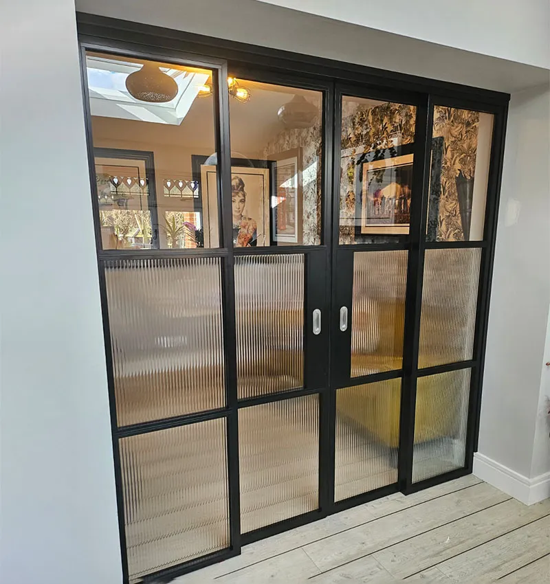 internal partition slider in black with reeded glass