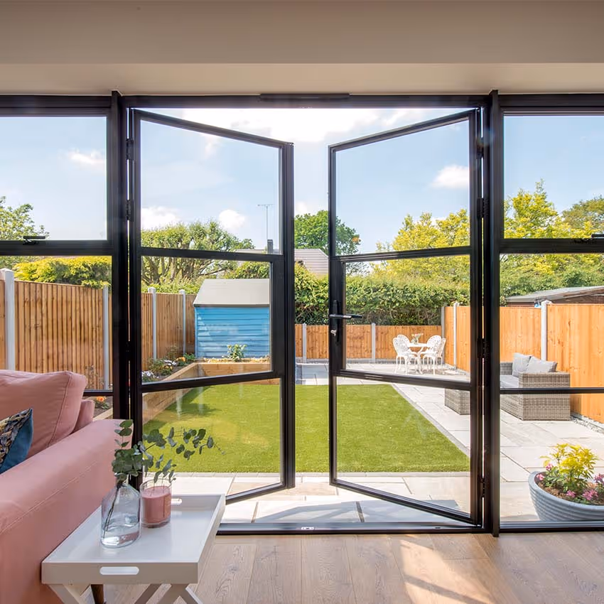 Garden view of aluminium steel look doors