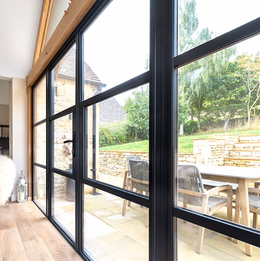 internal shot of grey heritage doors and sidelights in kitchen