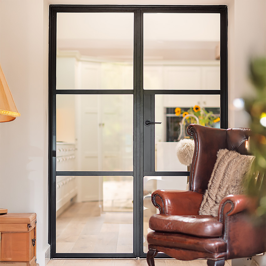 Black partition steel-look door in Crittall effect
