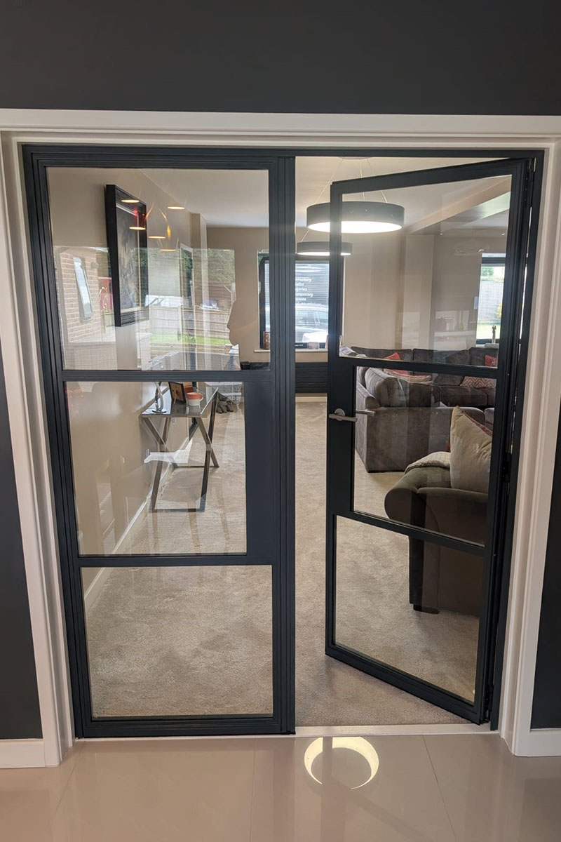 Internal French heritage door open into living room