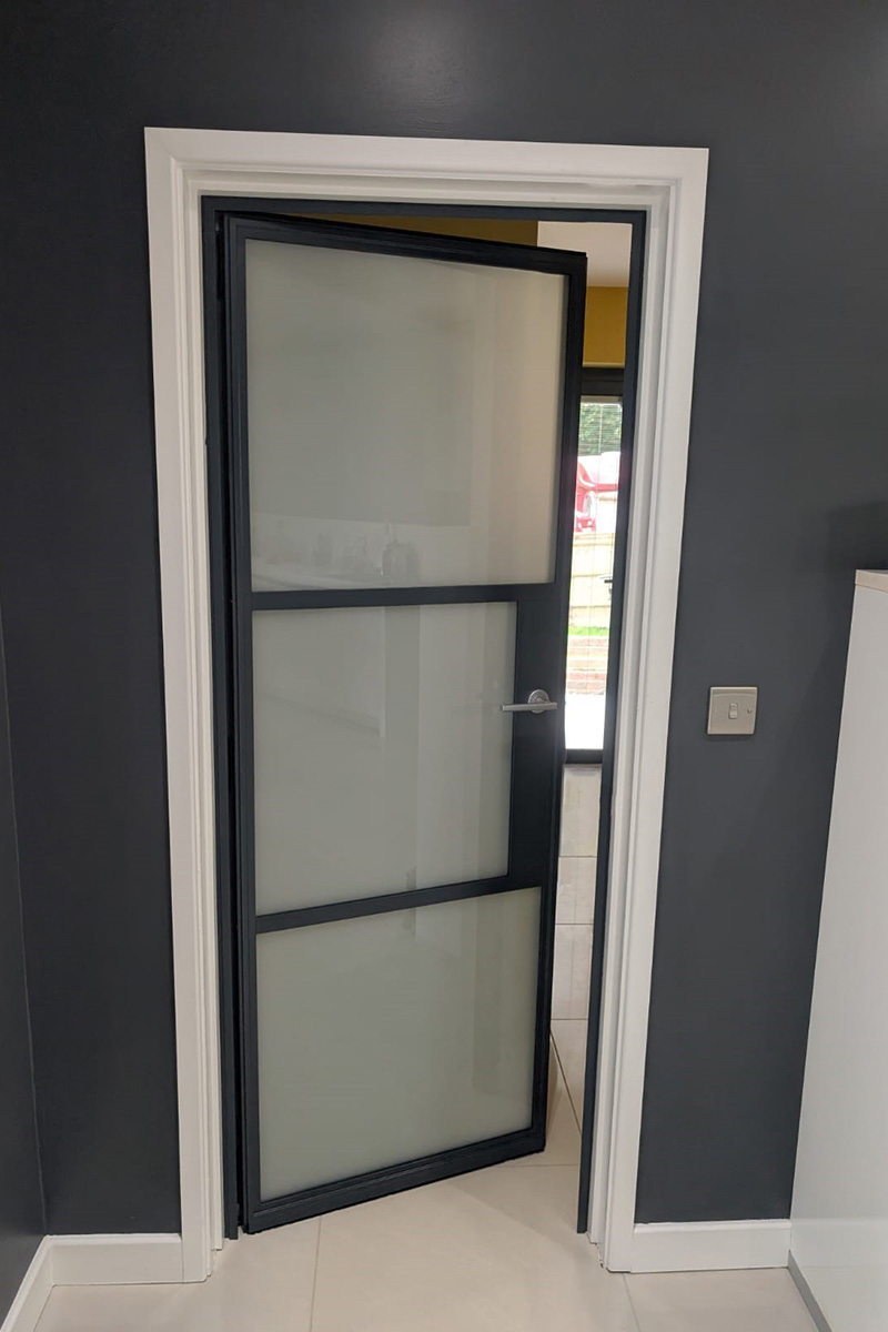 Grey internal steel look door with obscure glass
