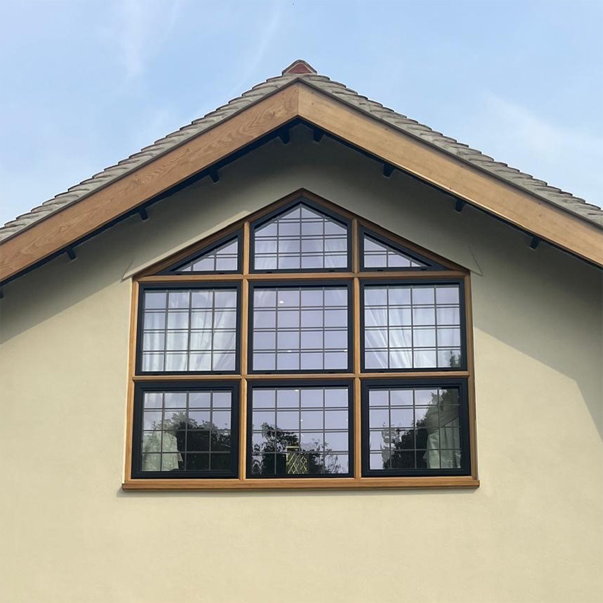 Black steel look windows in Timber sub frames on renovated house