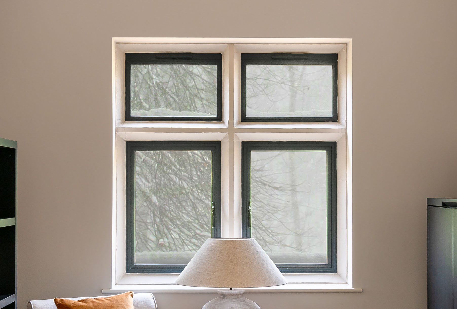 Snowy British weather shown through Decorio's slim steel replacement windows
