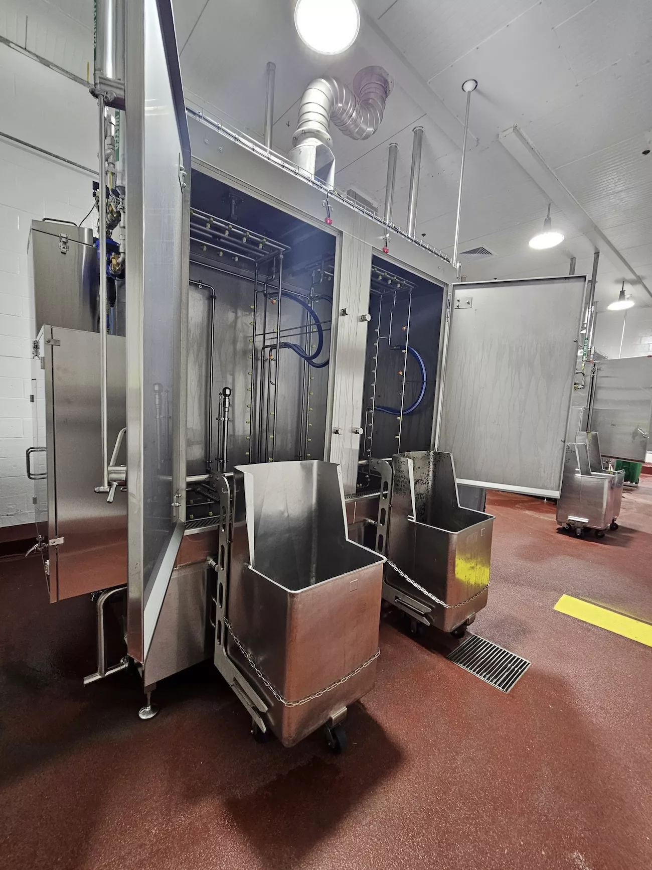 A double bin washer sanitising system built by Industrial Washing Machines