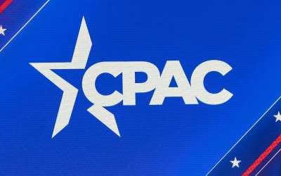 Why did the Revolution finally join AHCA and become a CPAC Member?