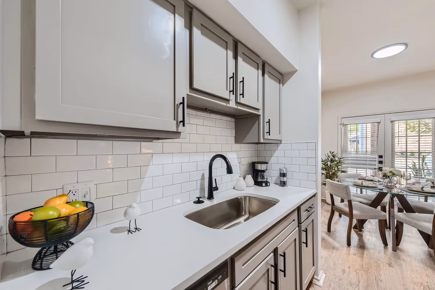 Kitchen island with black chairs