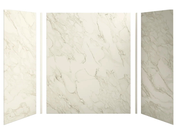 A three-piece pre-made acrylic shower wall surround with a white and gray marble pattern.