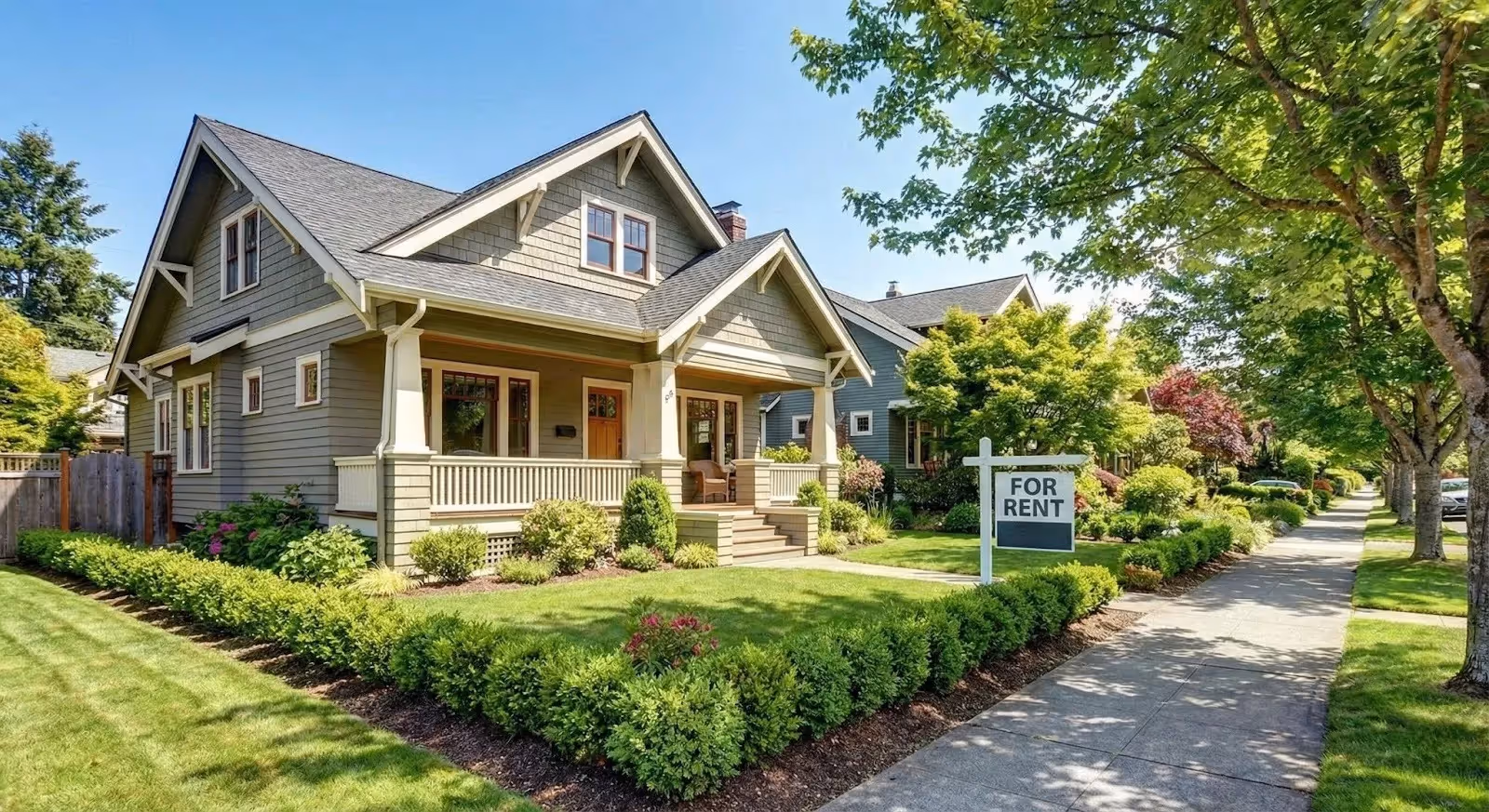 Well-maintained Seattle single-family rental home with a for-rent sign, representing vacancy costs and rental market competition.
