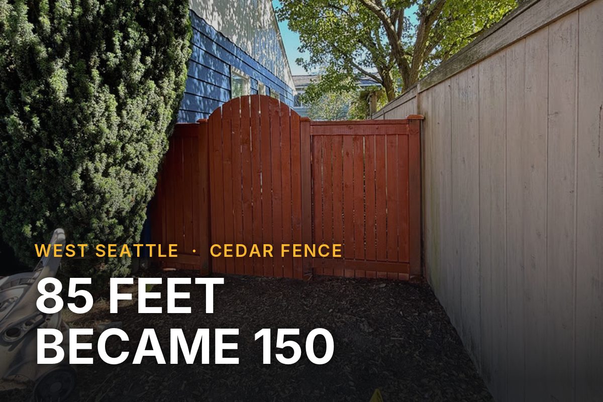 New redwood-stained cedar gate beside the original weathered grey fence in West Seattle, captioned "85 feet became 150."