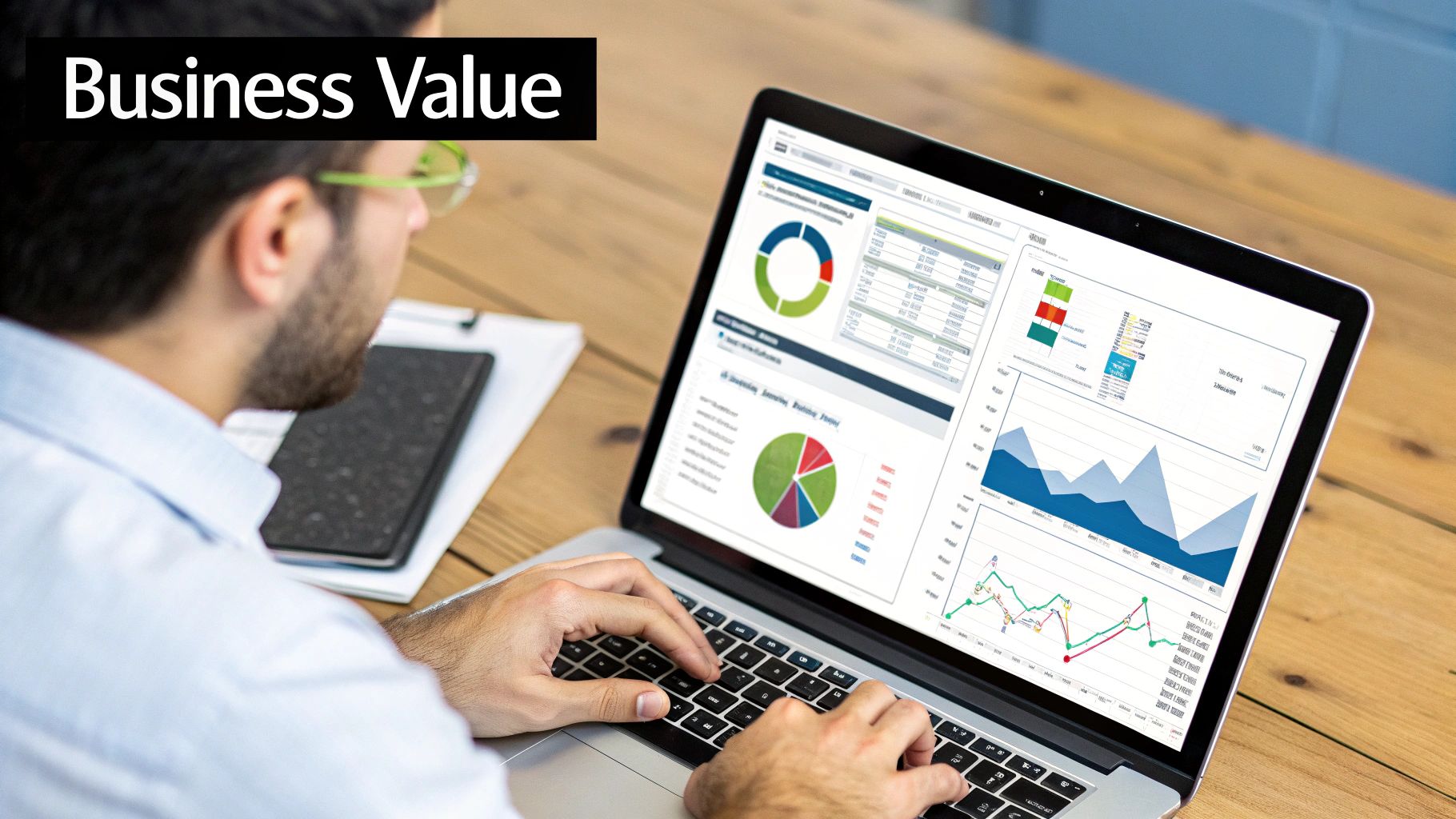 A person analyzing graphs on a screen, representing the business value driven by Snowpipe.