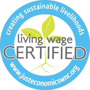 Living Wage Certified Badge displaying "creating sustainable livelihoods" and 3 leaf logo