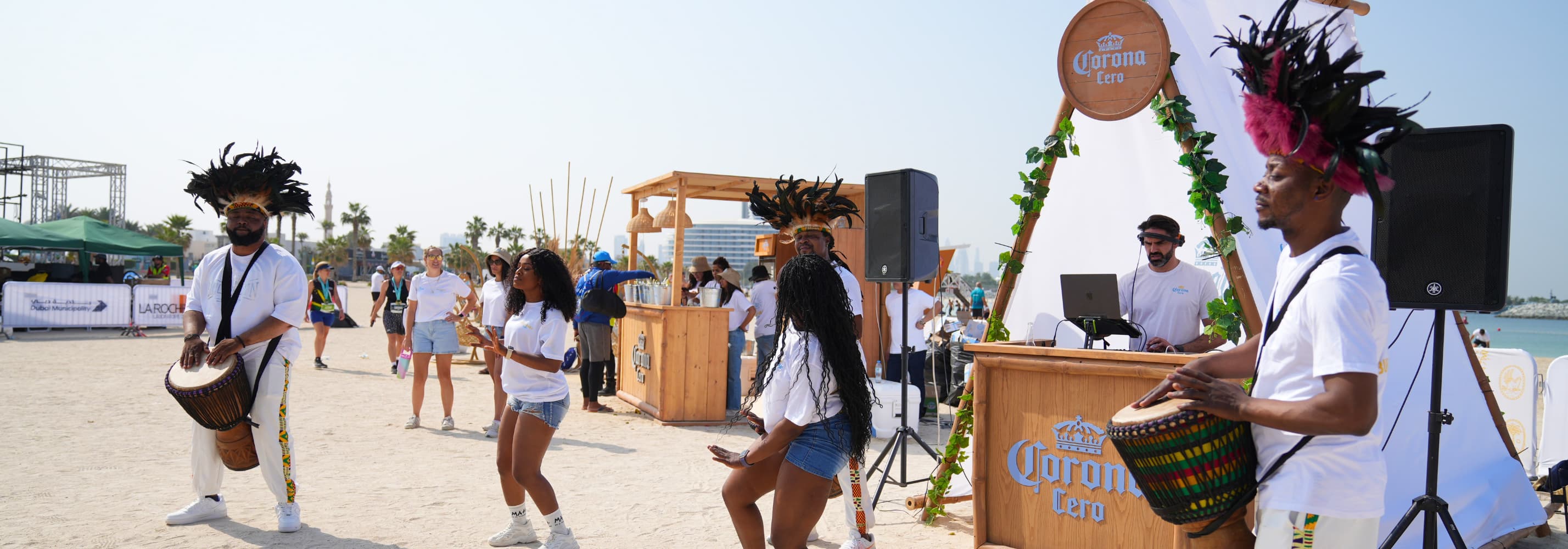 Corona Cero Beach Bar with drummers and runners