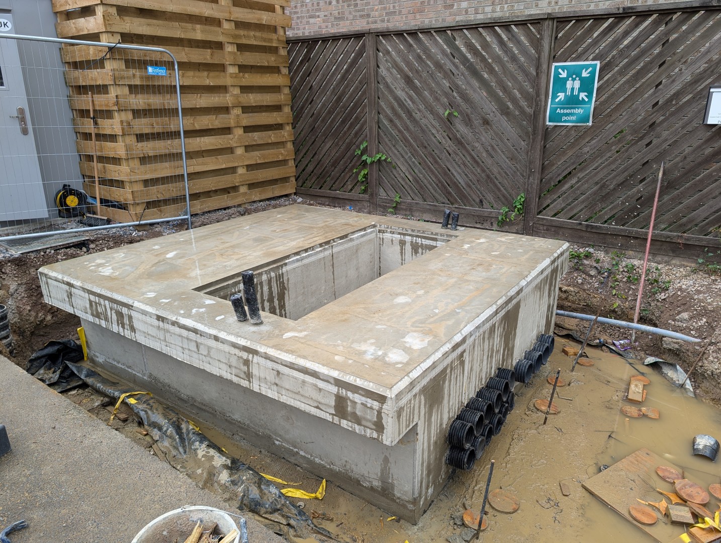 Cast concrete substation plinth with duct entries
