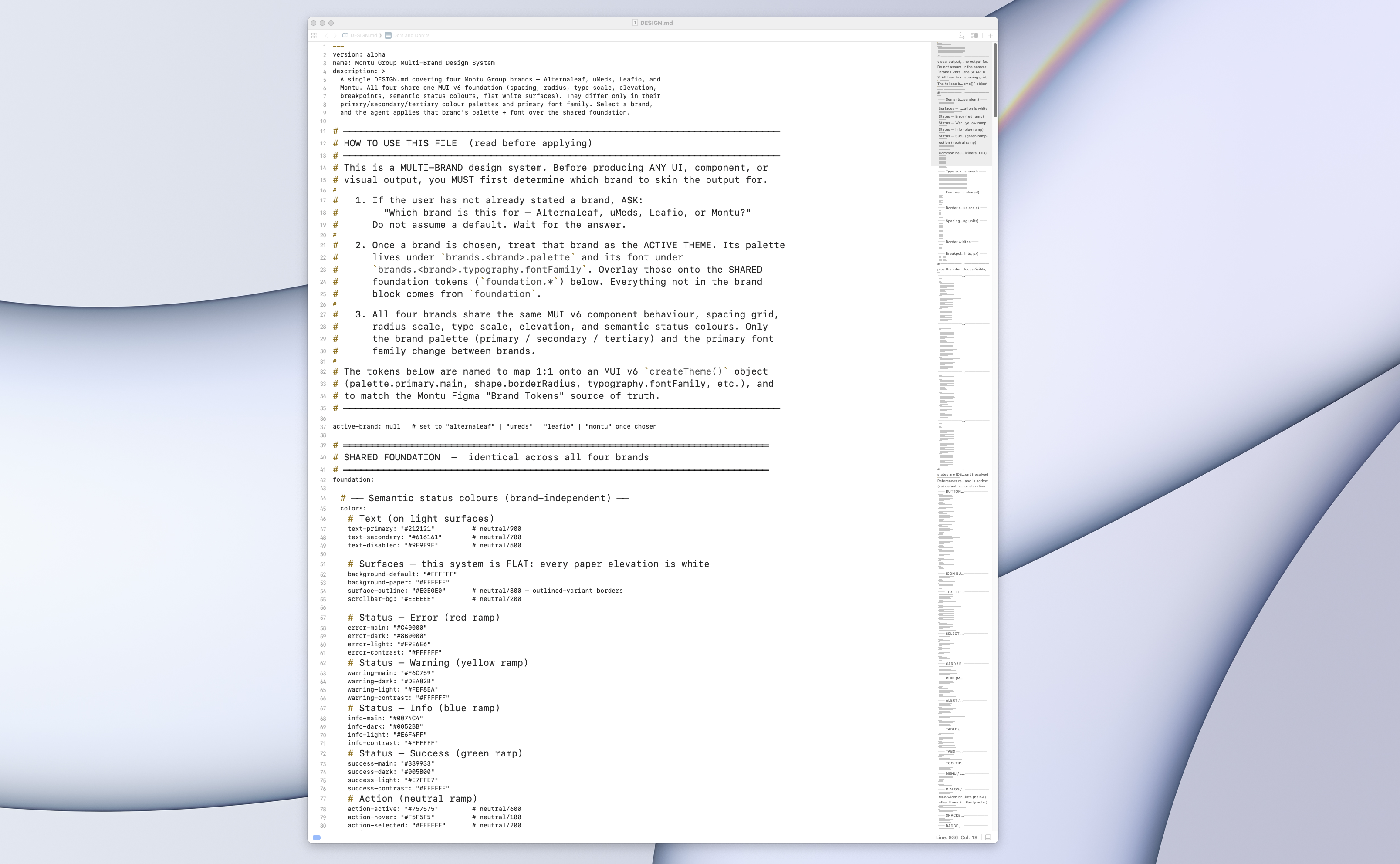 The DESIGN.md file open in an editor, showing the YAML header that tells AI tooling to ask which of the four brands it is designing for before producing anything