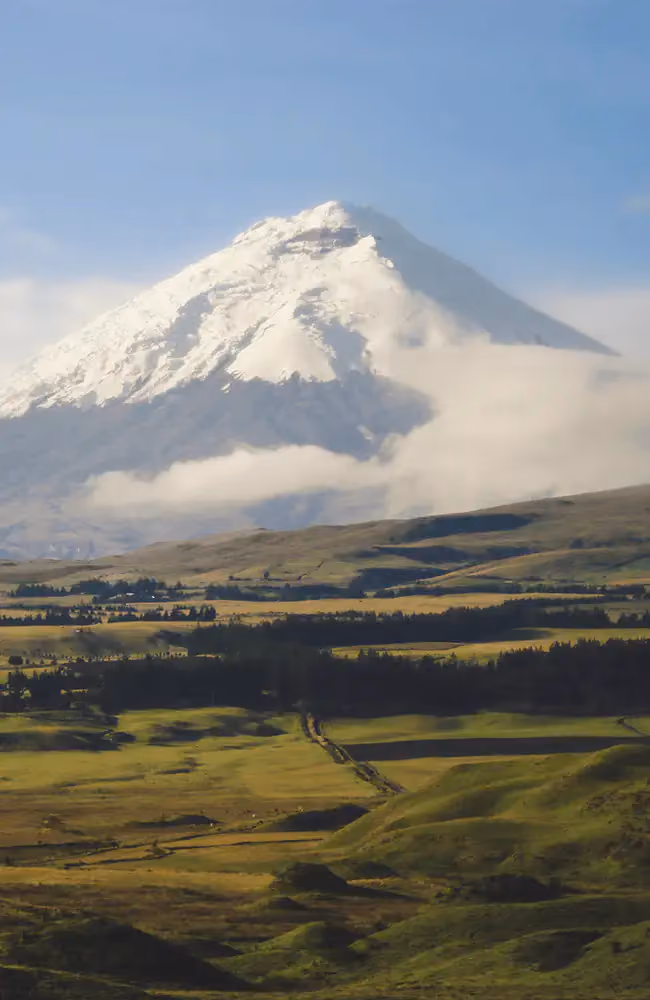 Turquoise volcanic crater lake and Cotopaxi National Park, Equatorial Affair Ecuador