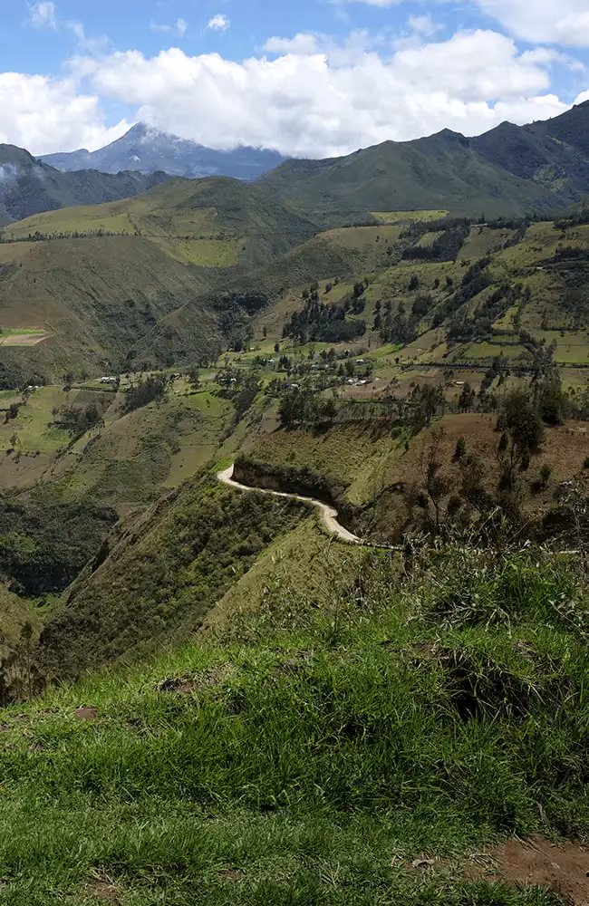 Dramatic Andes ascent on winding dirt roads, Equatorial Affair Ecuador