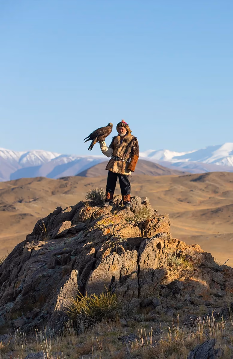 Kazakh eagle hunters near Ulgii, Cold Steppes Mongolia 4x4 expedition