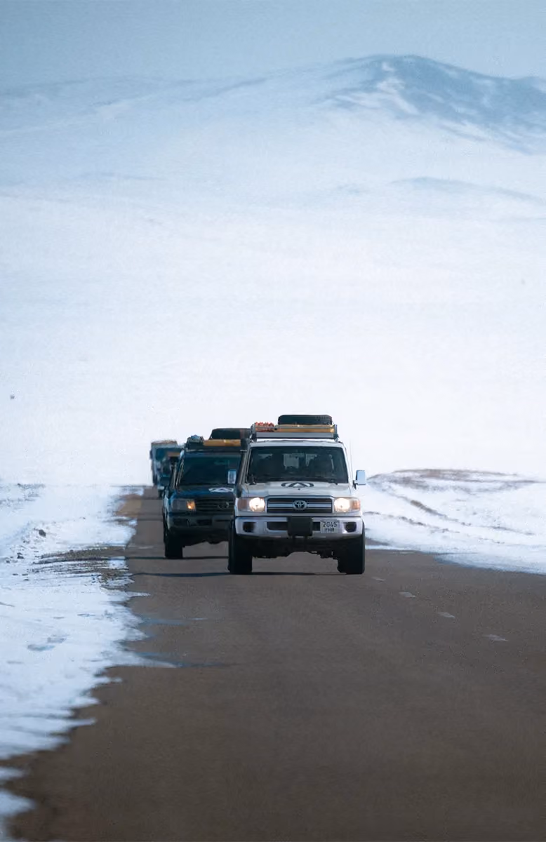 Tsetserleg journey through snow-covered dirt roads, Cold Steppes Mongolia