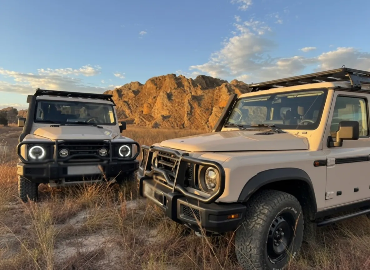 A 4x4 driving a red dirt track through the bush in Madagascar