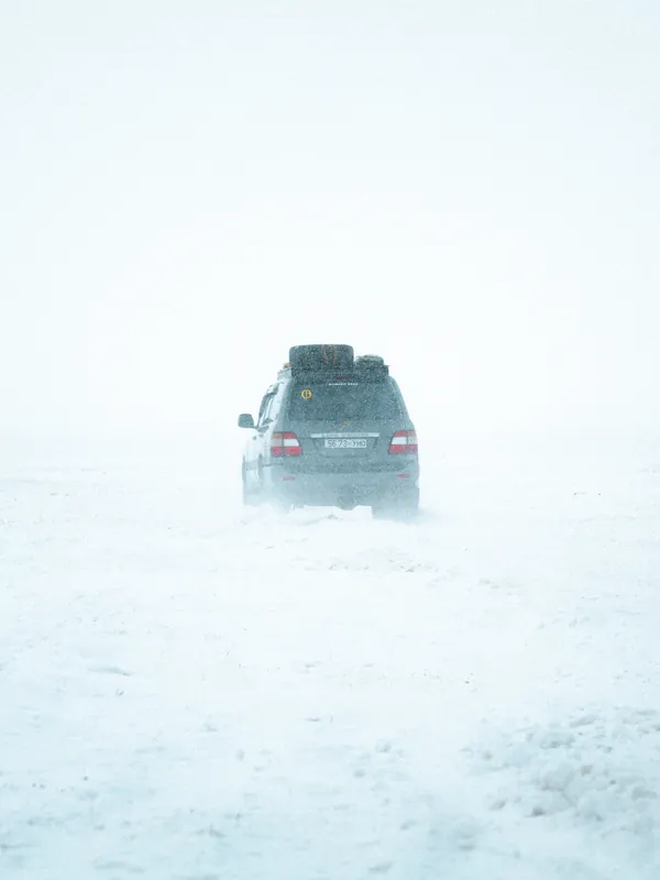 A Land Cruiser in a winter snowstorm in Mongolia