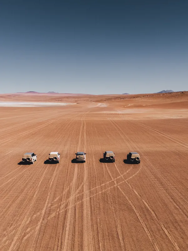 A convoy of 4x4s on the high desert of Bolivia