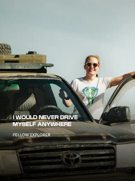 A fellow explorer standing by a 4x4 on a Nomadic Road expedition: I would never drive myself anywhere