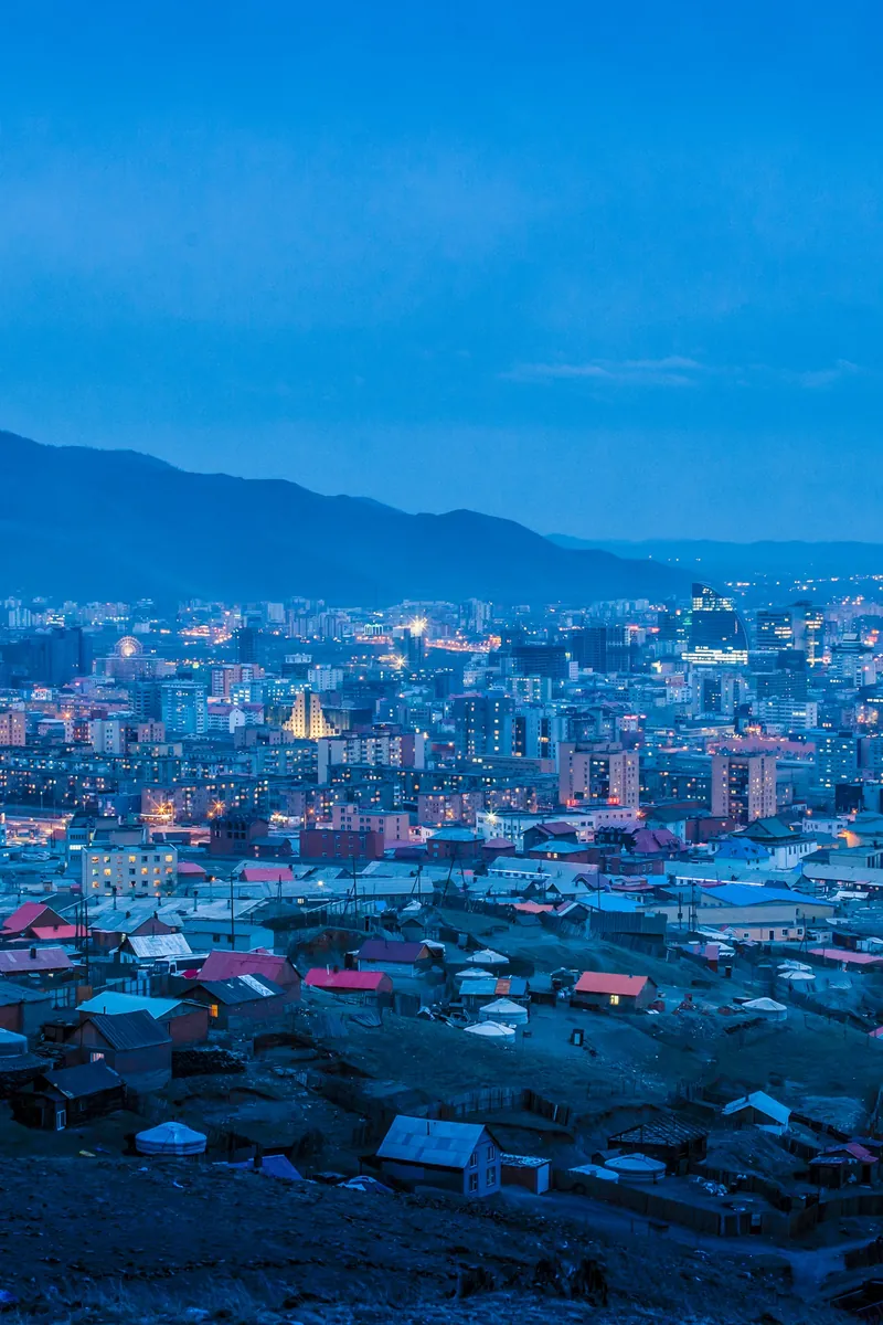 Ulaanbaatar at dusk in winter, seen from the hills, Mongolia