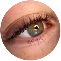 eye with lashes curled from a lash lift and tint