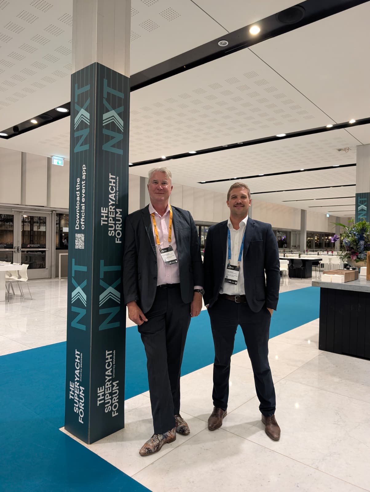two men stood at the superyacht forum
