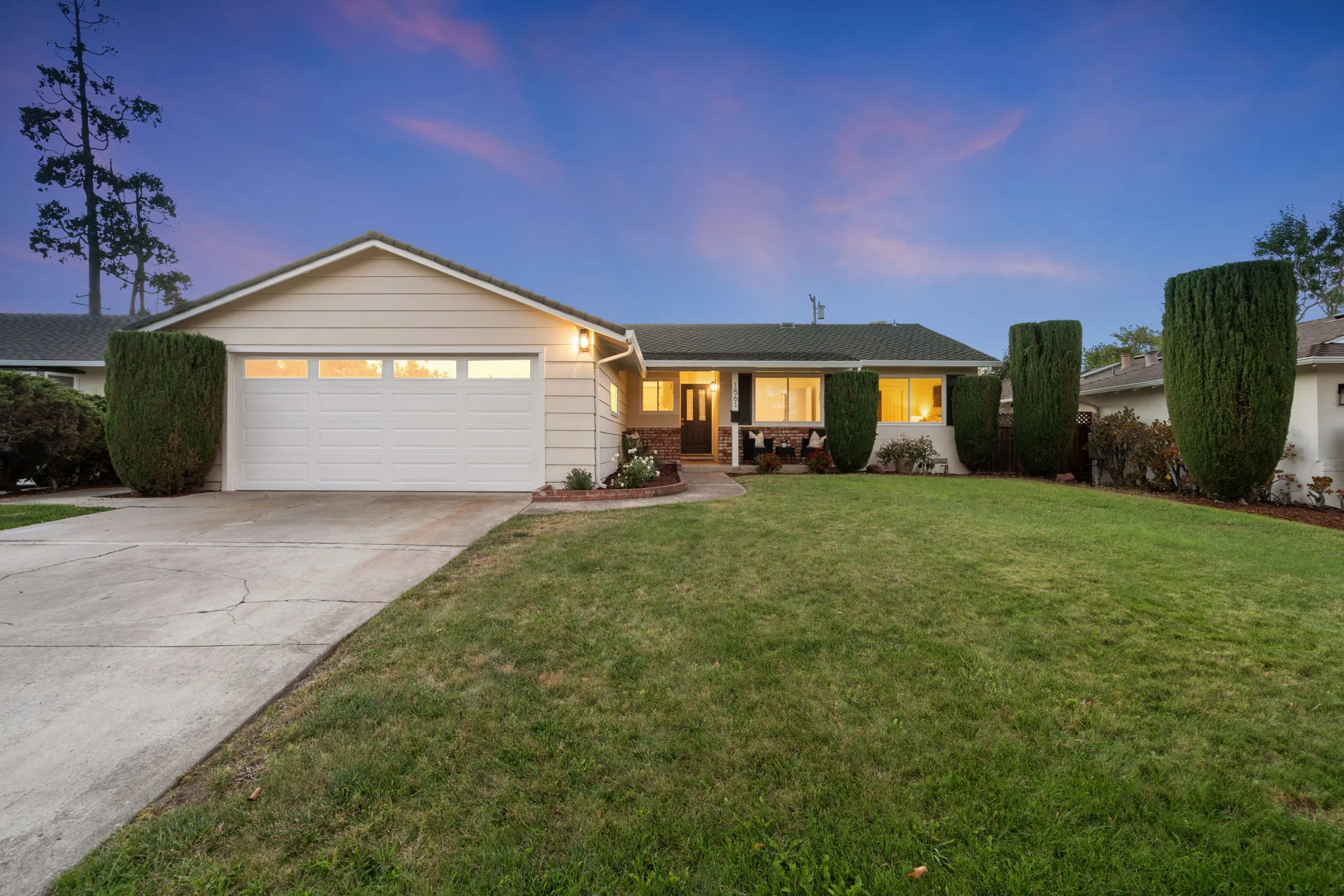 A single-family home with a landscaped front yard in Milpitas, California