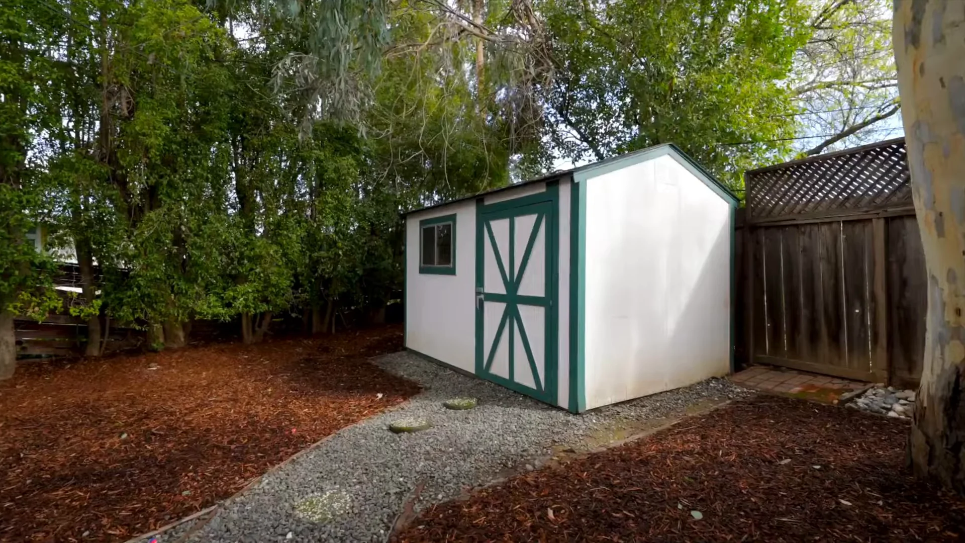 Rear yard with storage shed at 1172 Scotland Dr, Cupertino