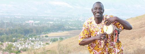 Massamba Diop with his Tama.