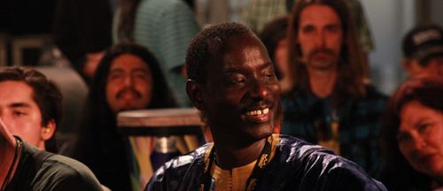 Massamba Diop with university students in a workshop