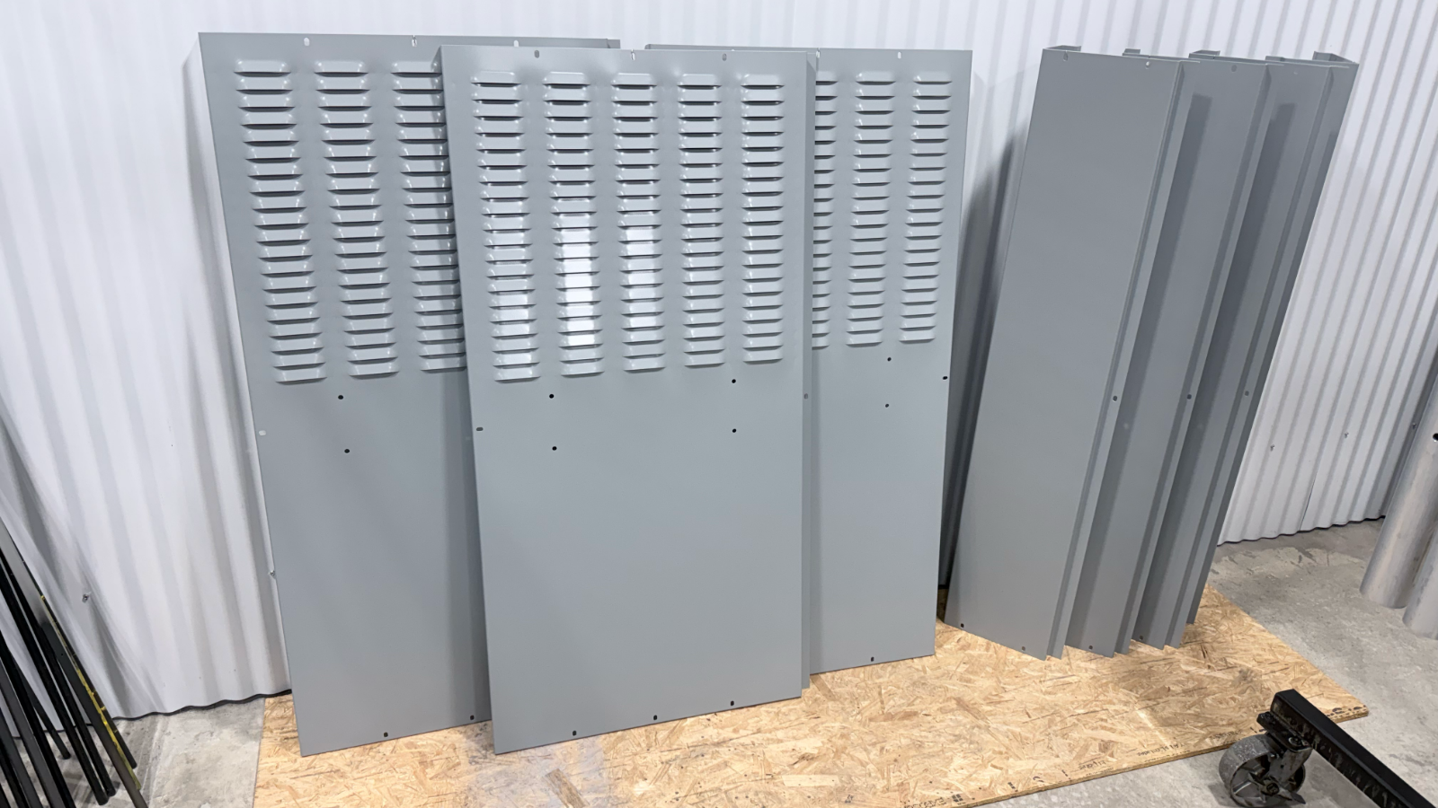 Electrical enclosure with custom louvers