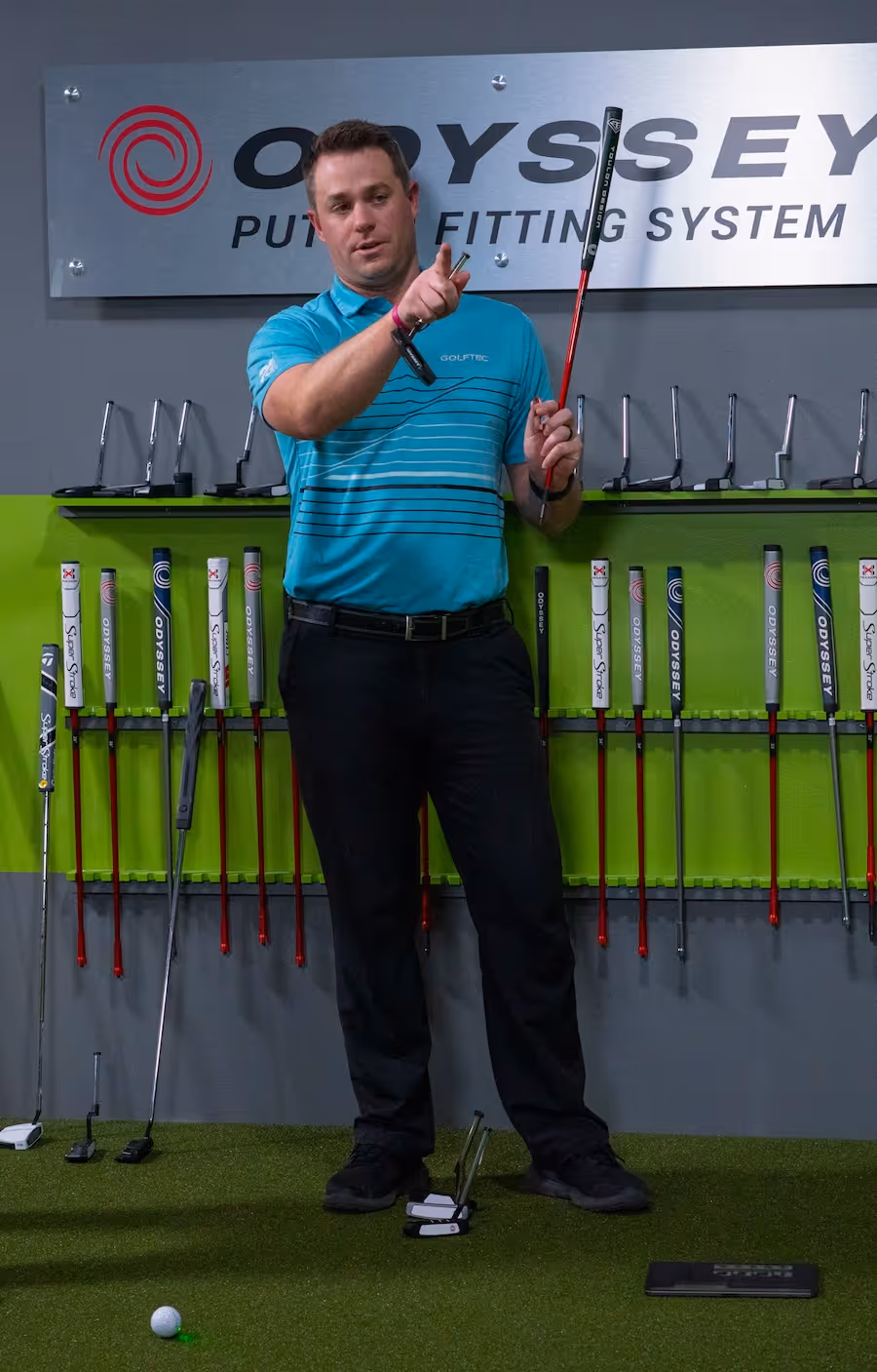 Top golf coach Josh Troyer giving a golf lesson
