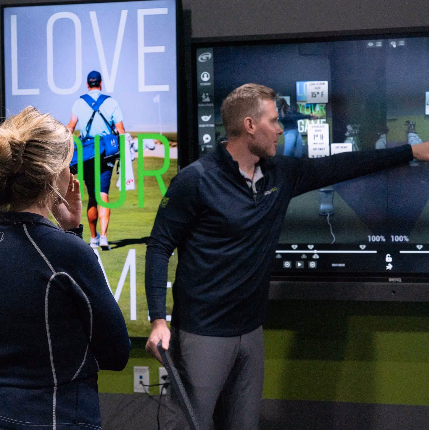 Brad showing a student his swing on video during a golf lesson