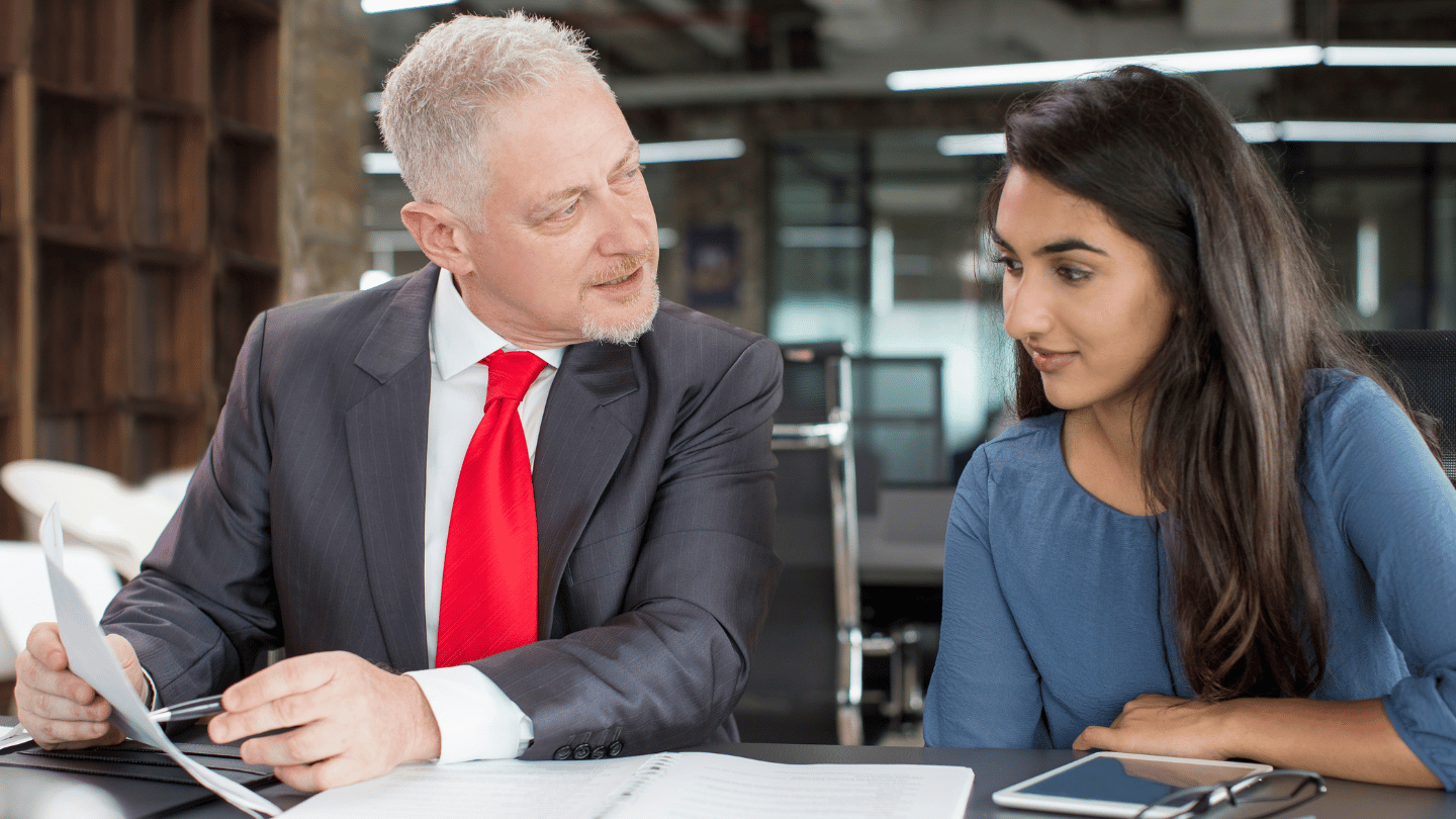 two employees meeting one on one to discuss planning