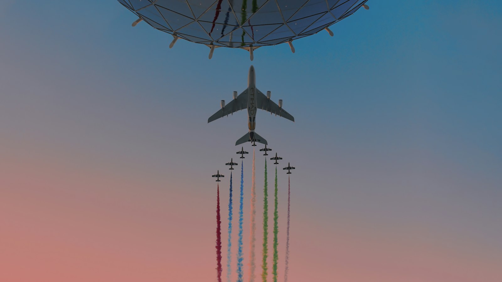 Avion de ligne et patrouille acrobatique survolant le circuit de Yas Marina pendant le Grand Prix d'Abu Dhabi