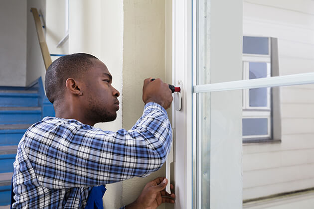 man installing a window