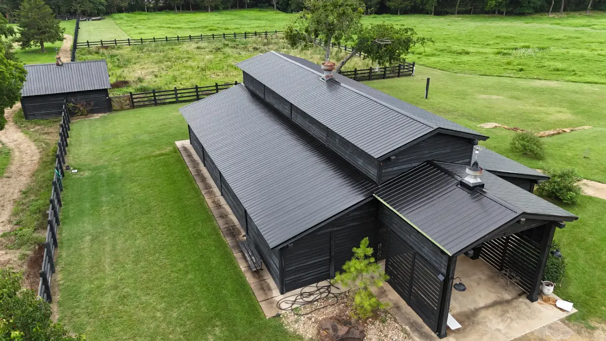 A angled front view of a premium metal roof installed by Roofit Roofing & Construction onto a residential home.